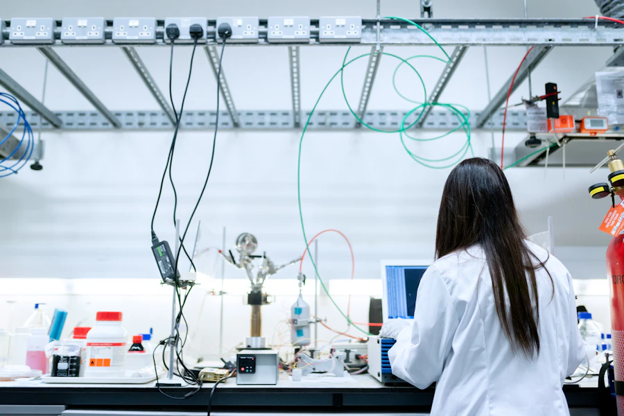 A researcher working with equipment in a modern laboratory